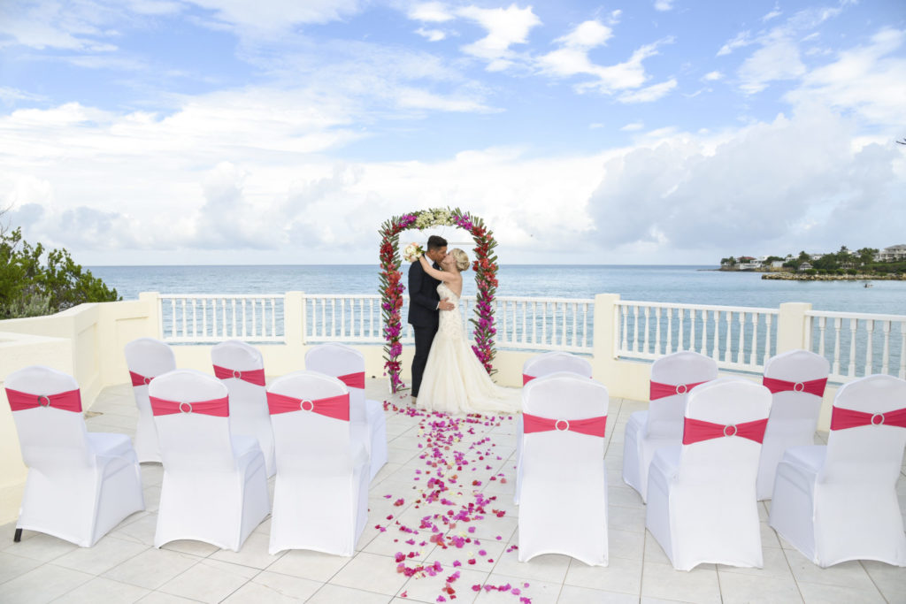 Wedding abroad with bride and groom at a beach wedding